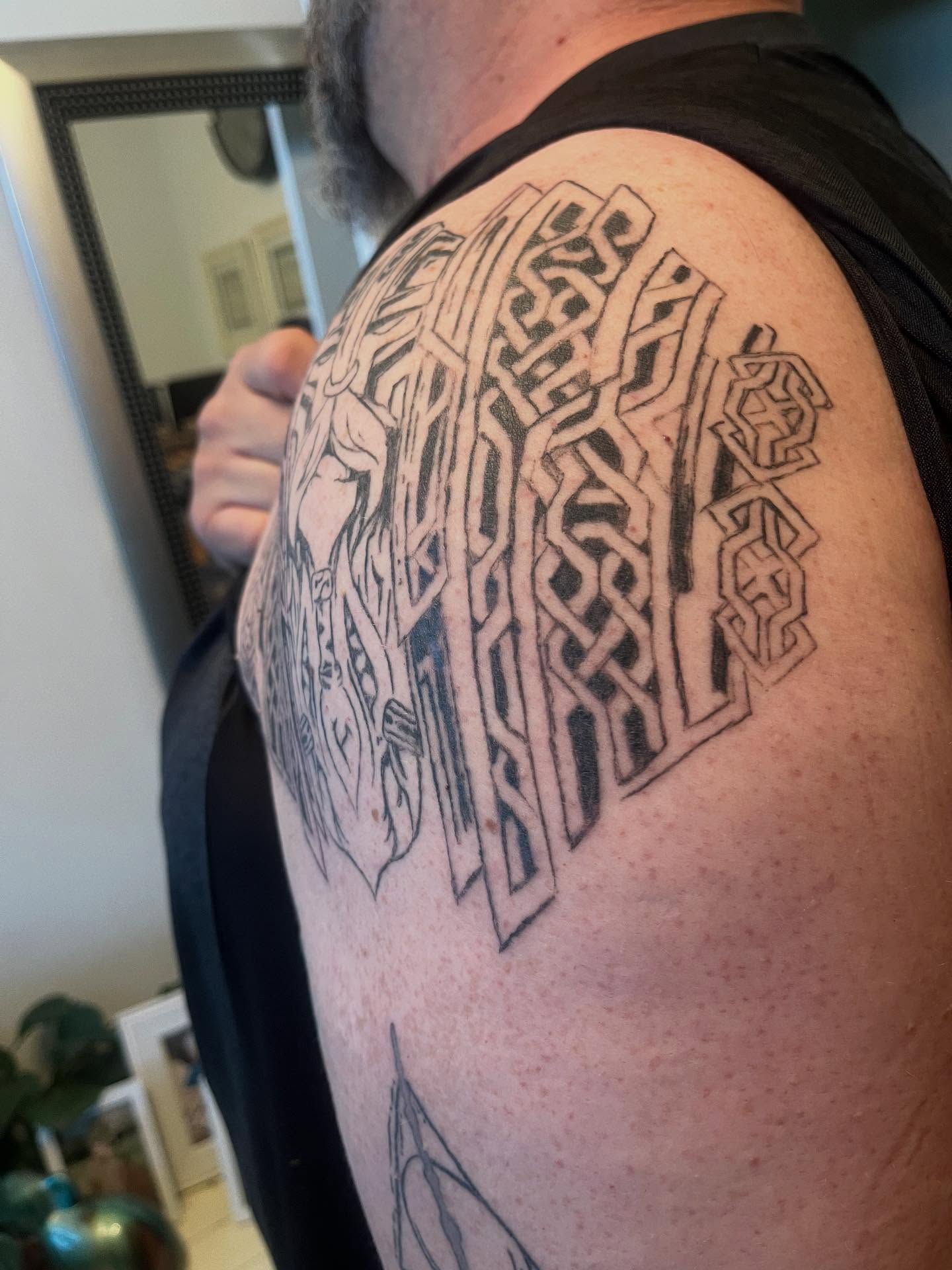 Geometric pattern geometric tattoo on the shoulder by Val Maughan