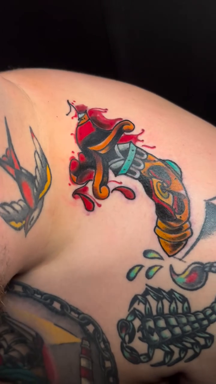 Dagger with blood and scorpion American traditional tattoo on the shoulder by vannadoestattoos