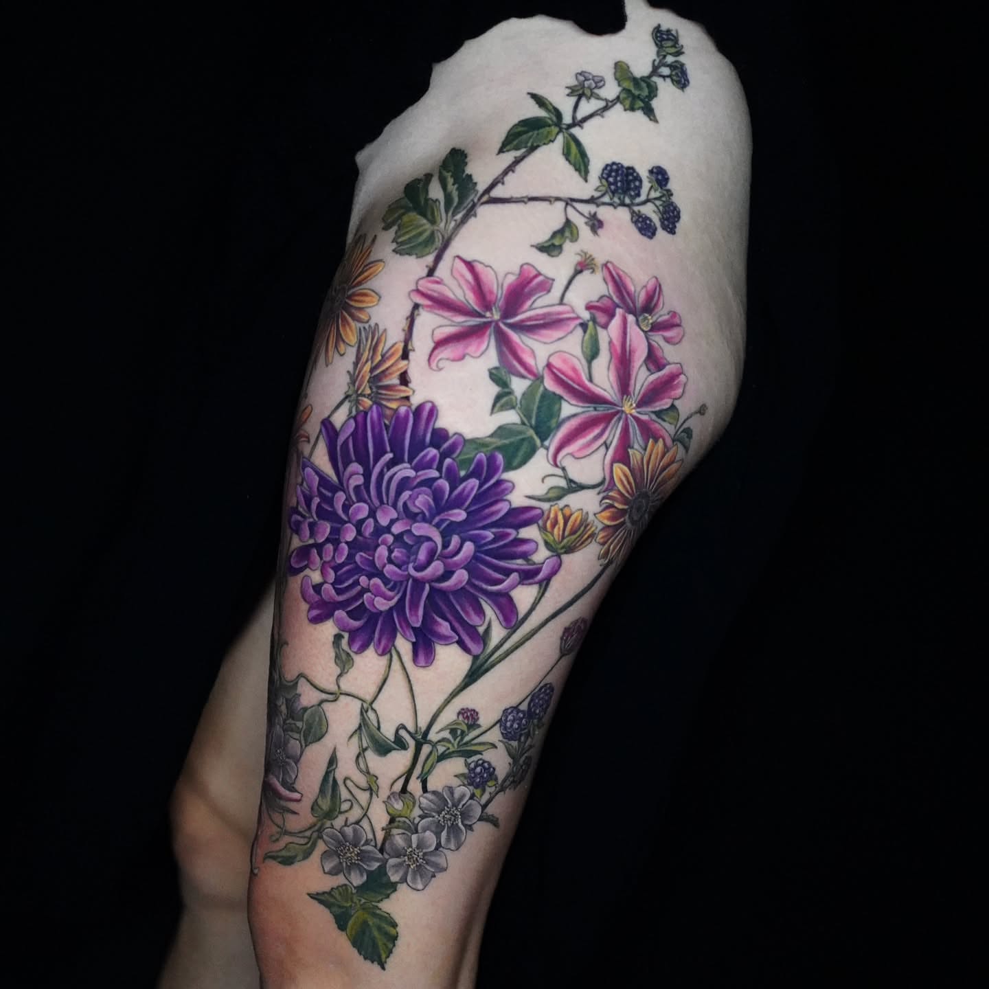 Floral bouquet realism tattoo on the forearm by Shar - Utah Tattoo Artist