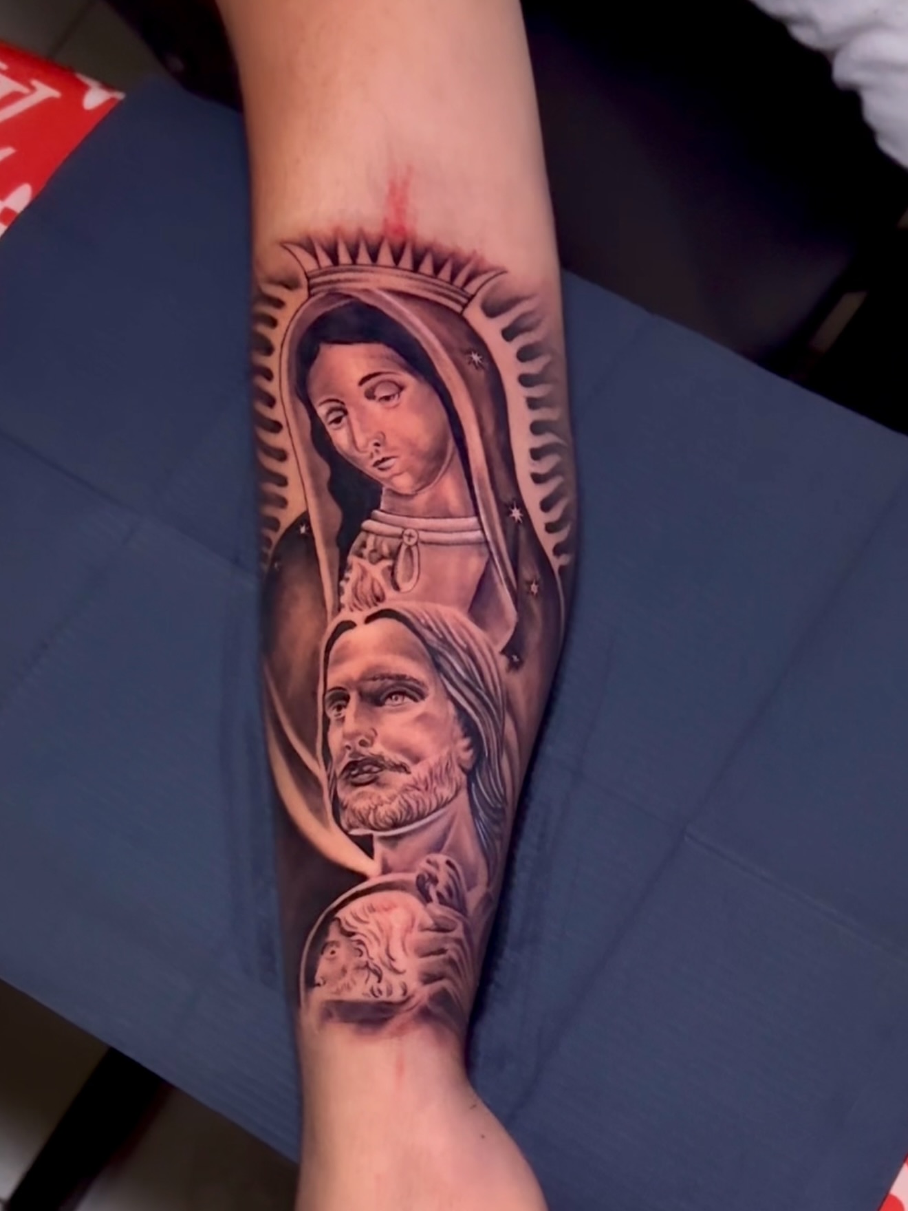 Religious figures black and grey tattoo on the forearm by Erick @ AZTEC_TATT