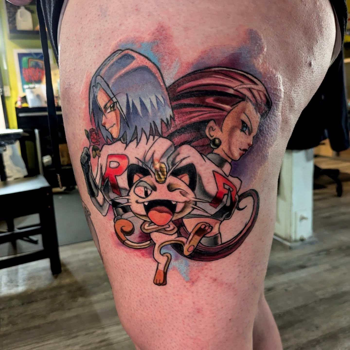Anime characters and cat anime tattoo on the thigh by Lahel (Lay-el) Fowler