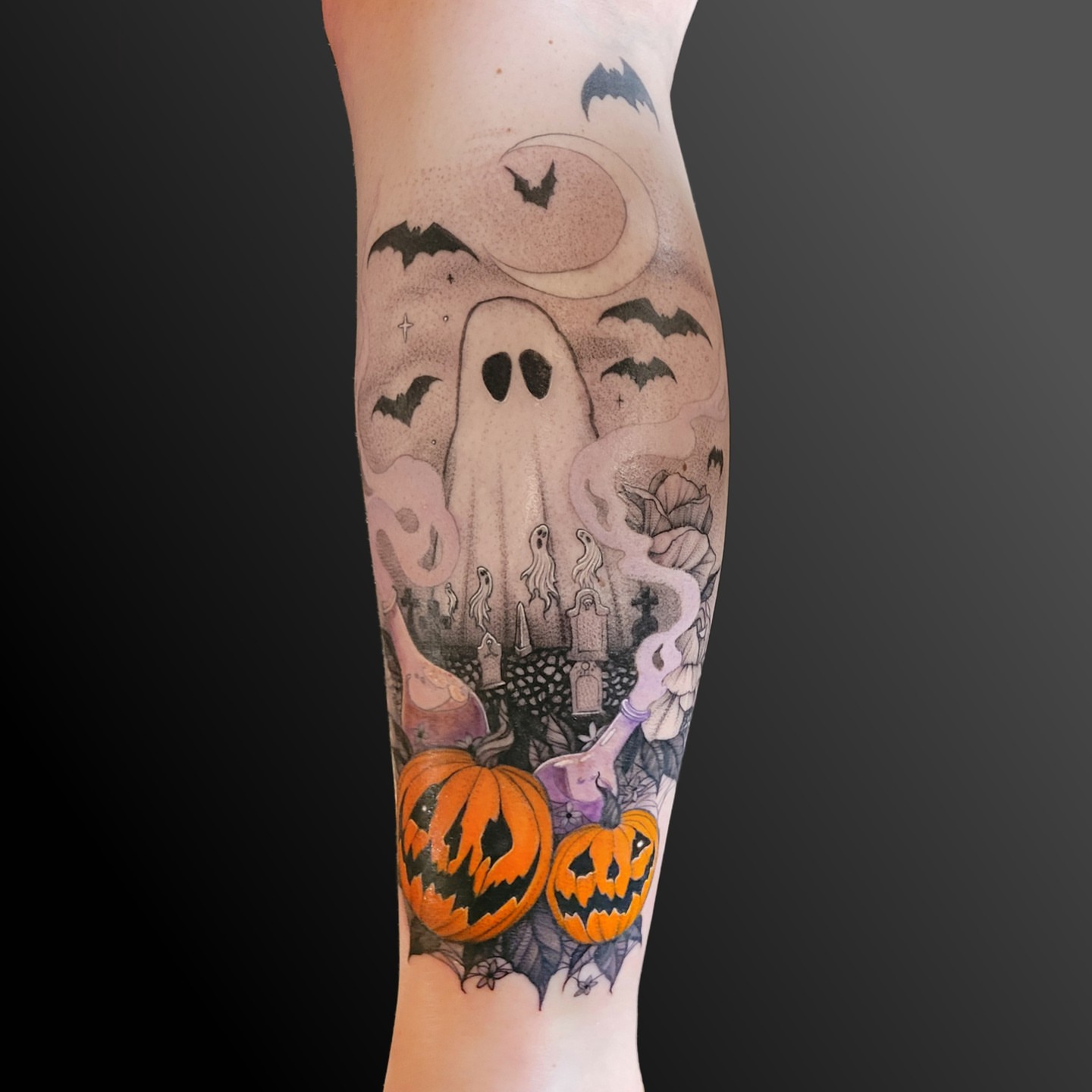 Halloween ghost and pumpkins dotwork tattoo on the forearm by Arick Reese