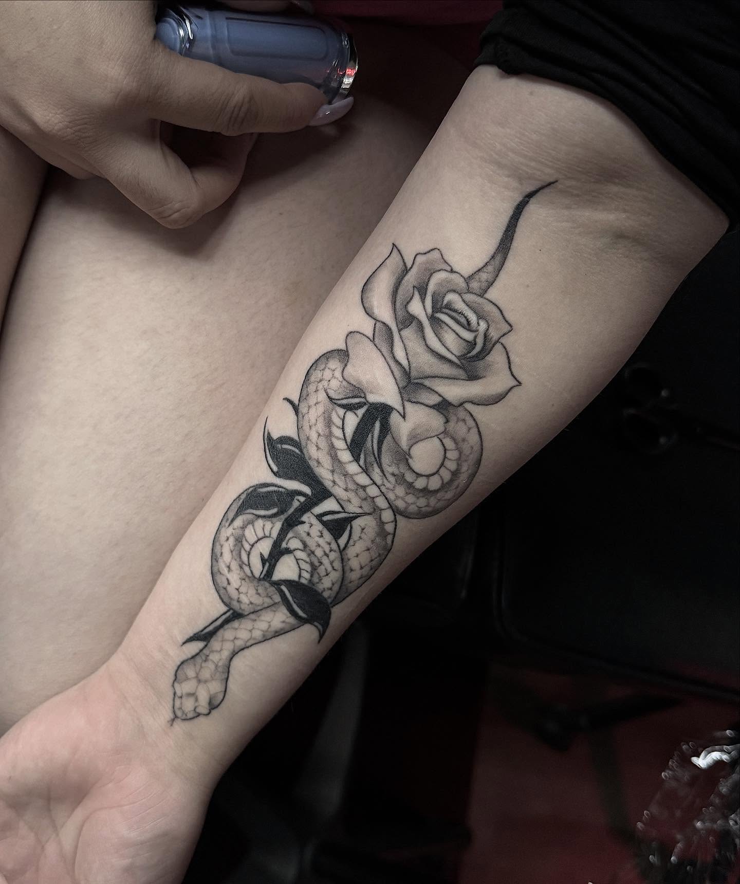 Snake and rose realism tattoo on the forearm by INK with KIRON 🇳🇵 🇺🇸DTX, Dallas, Texas