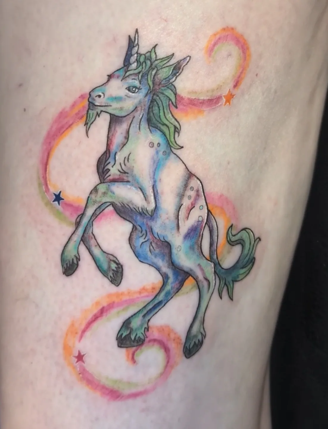 Tattoo by @druidloutattoo — watercolor