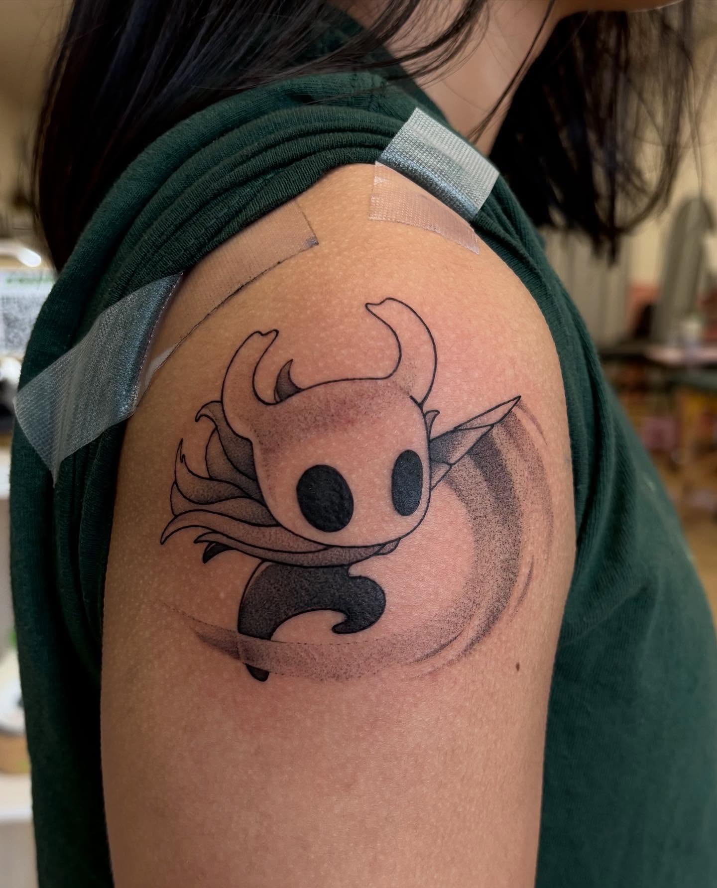 Hollow knight black and grey tattoo on the shoulder by joely