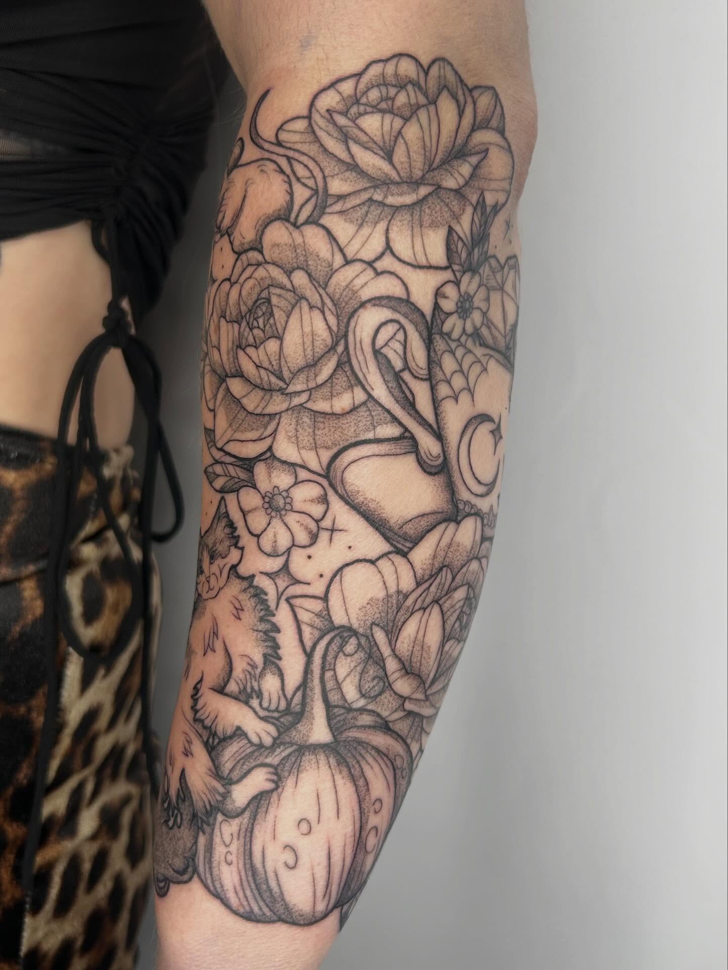Floral bouquet dotwork tattoo on the forearm by Poppy Olivia Deards