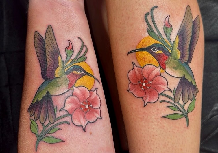 Hummingbird and flowers new school tattoo on the forearm by Hannah Casadonti