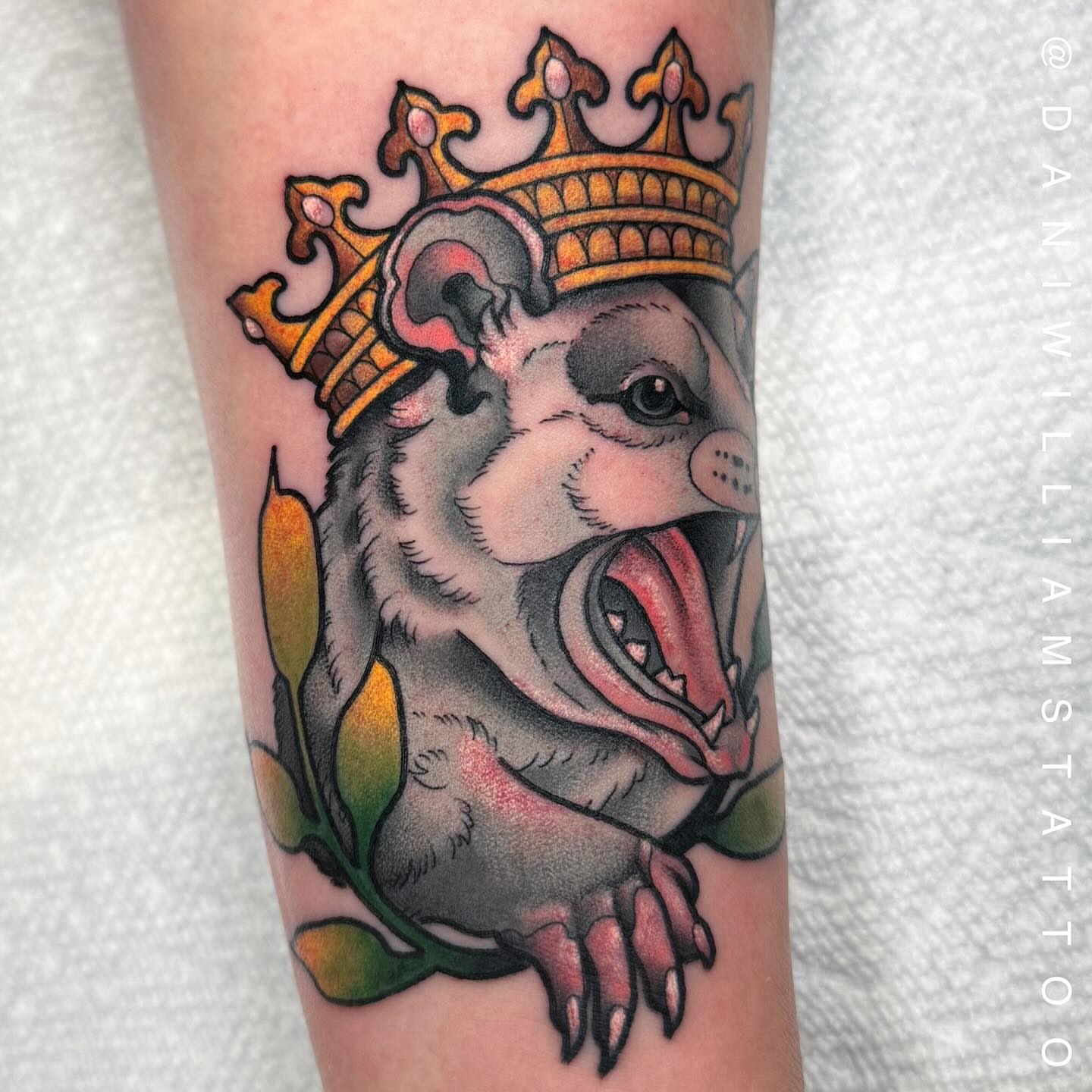 Rat wearing crown American traditional tattoo on the forearm by Dani Johnson