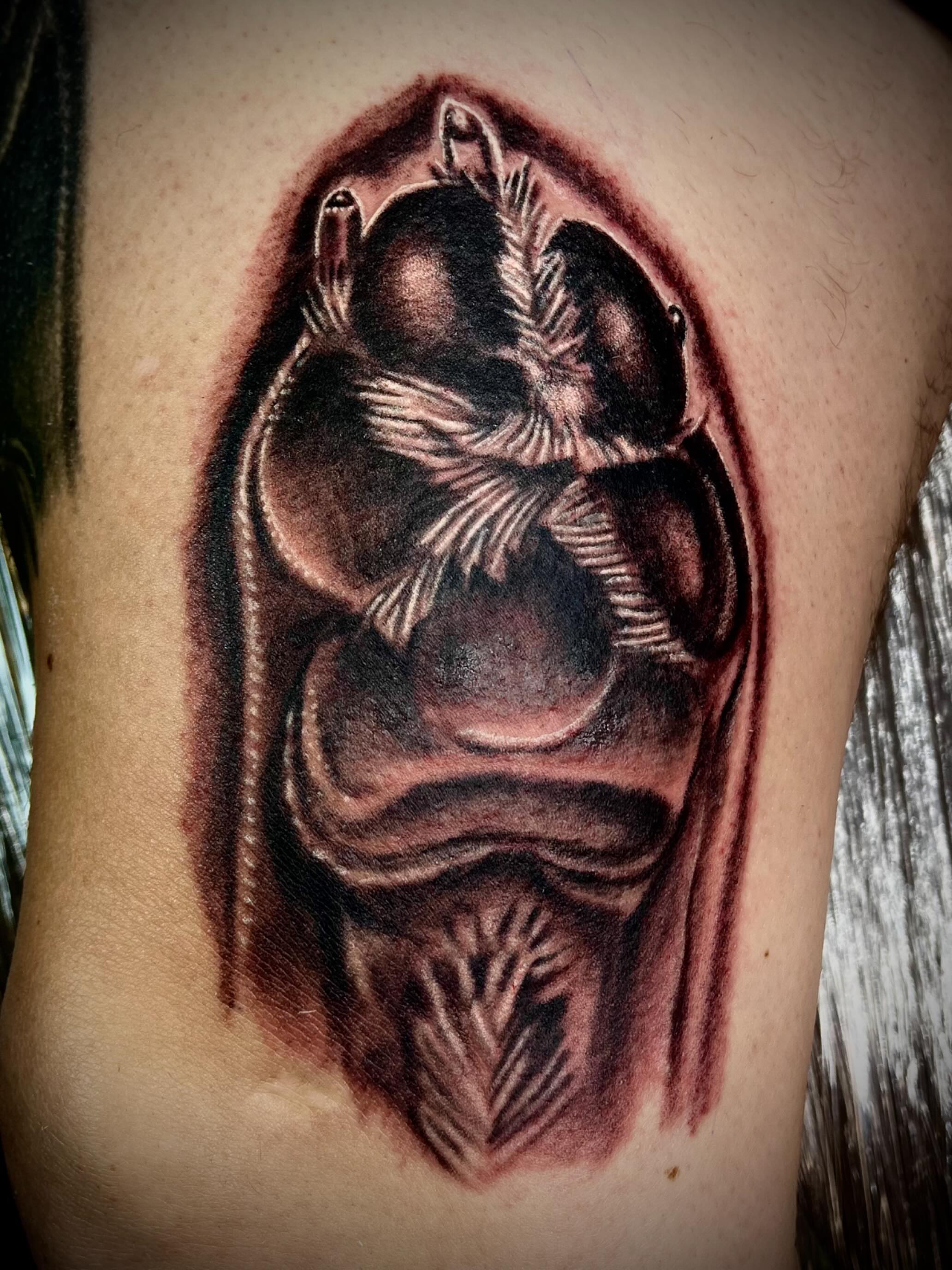 Owl realism tattoo on the ribs by Bobby Glennon