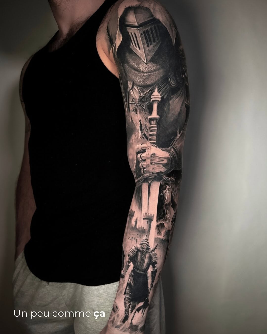 Knight with sword and castle realism tattoo on the forearm by Eltche Art Tattoo