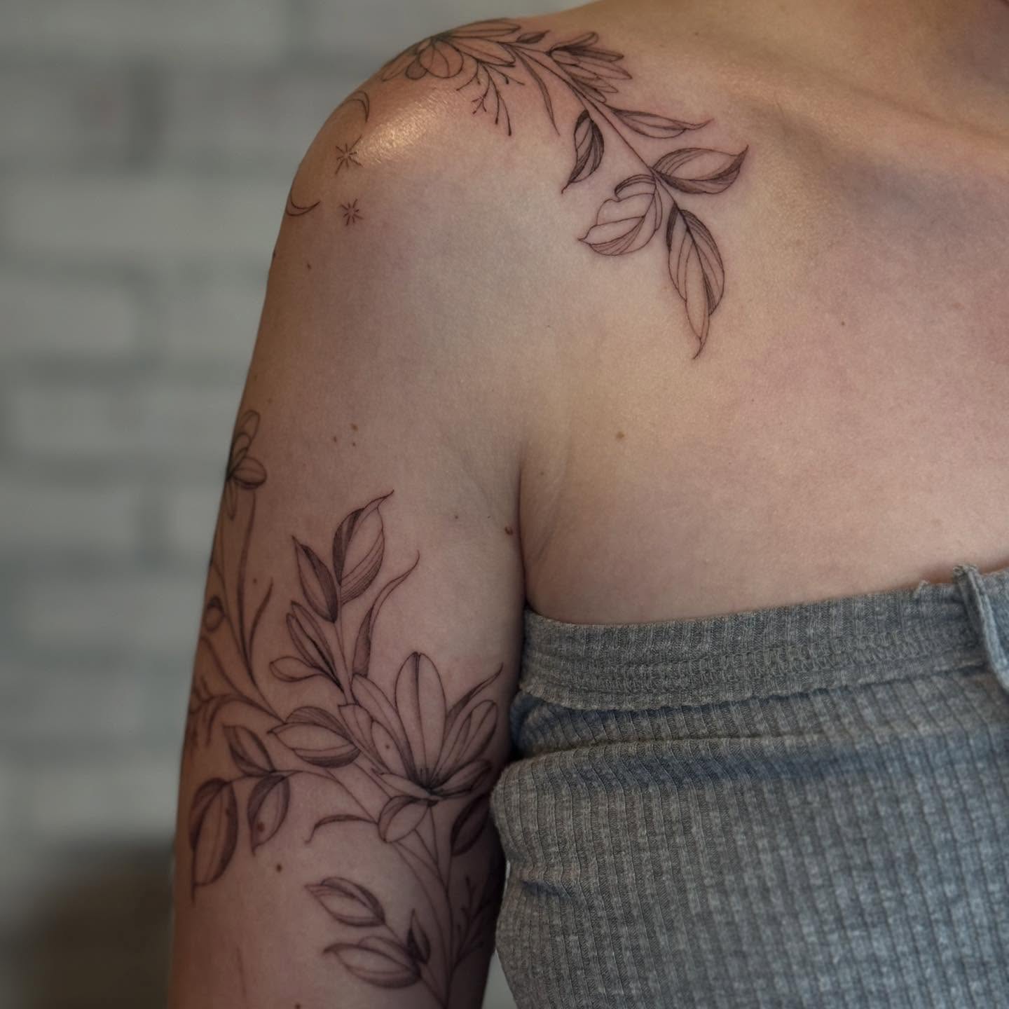 Floral black and grey tattoo on the shoulder by ❀ Moo, Mount Laurel, New Jersey