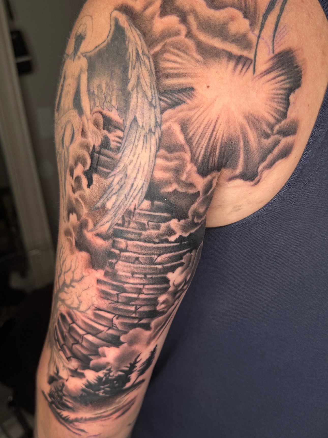 Phoenix rising realism tattoo on the upper arm by Visionary🌌