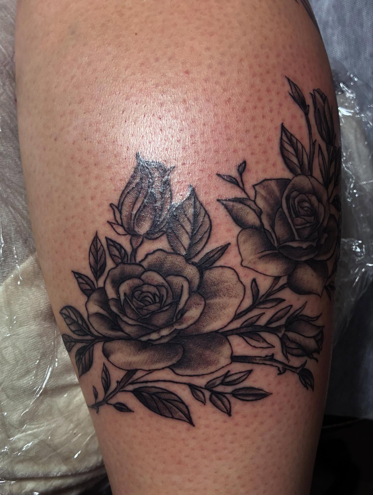 Roses black and grey tattoo on the thigh by Nessa, Las Vegas, Nevada