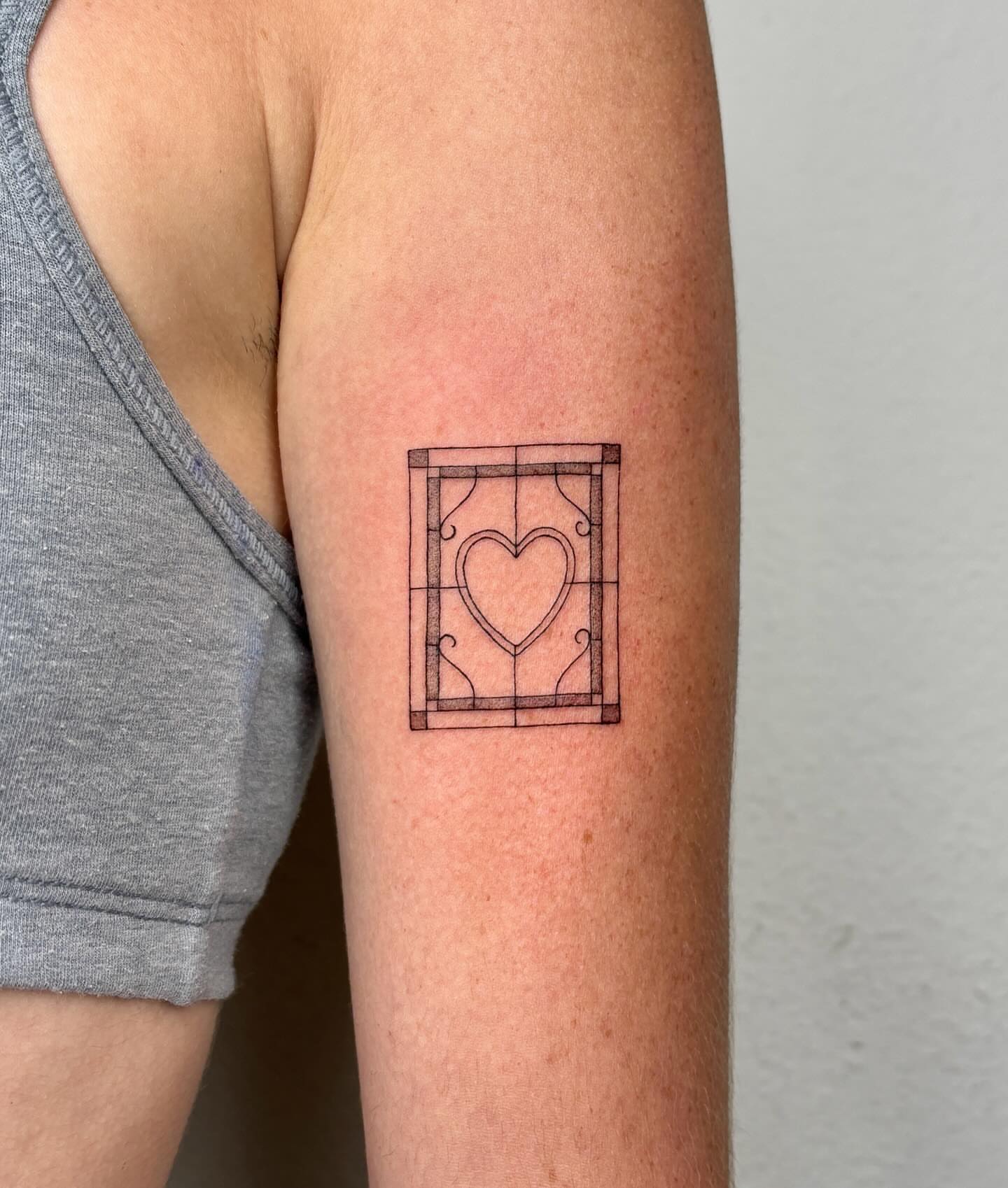 Heart in stained glass geometric tattoo on the forearm by alyssa doing tattoos