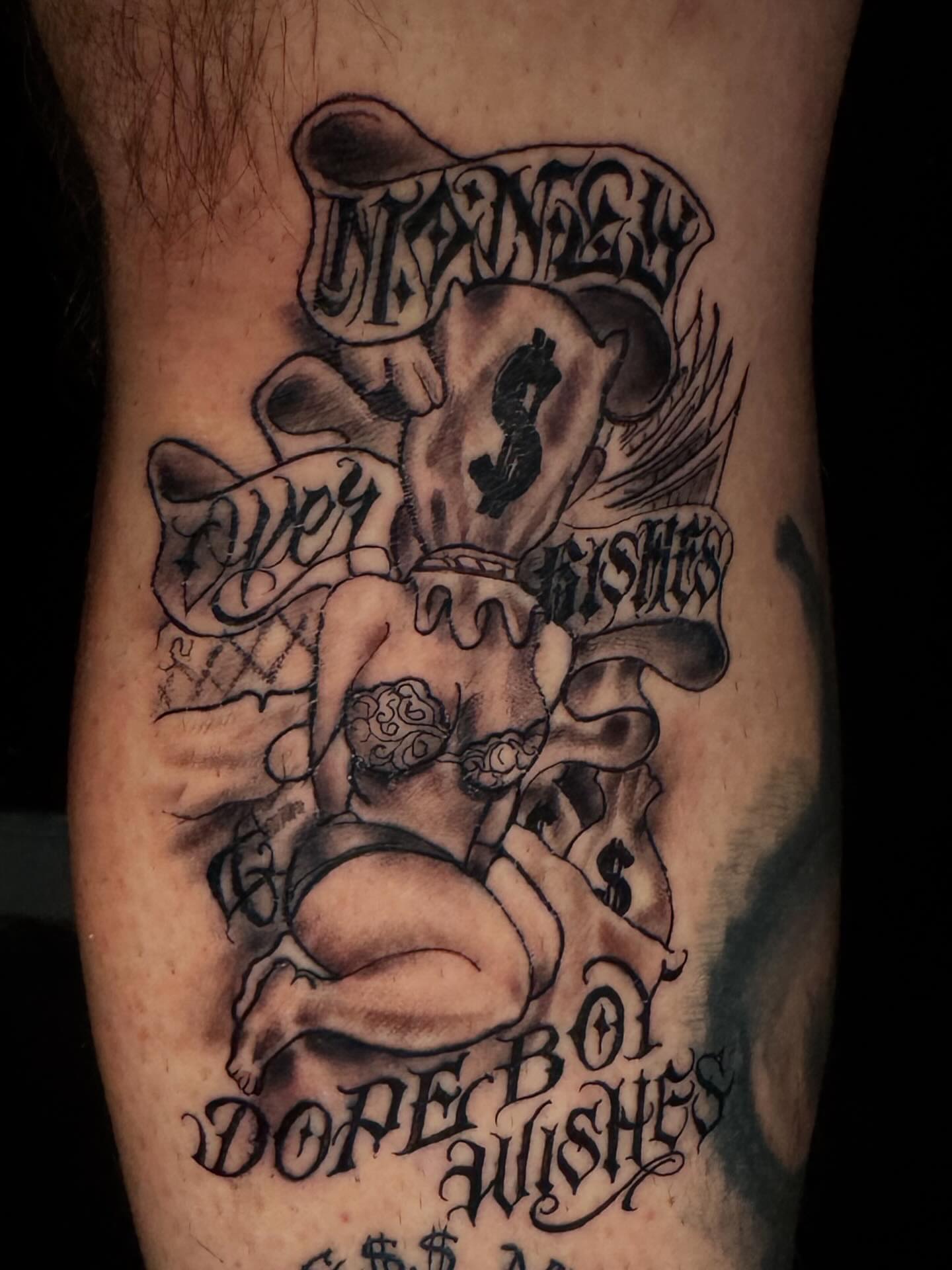 Money bag and angel black and grey tattoo on the forearm by @_frankyvee