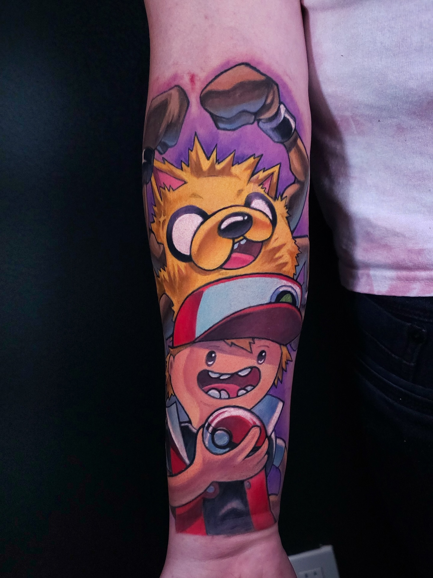 Anime characters anime tattoo on the forearm by Brandon Hildebrandt