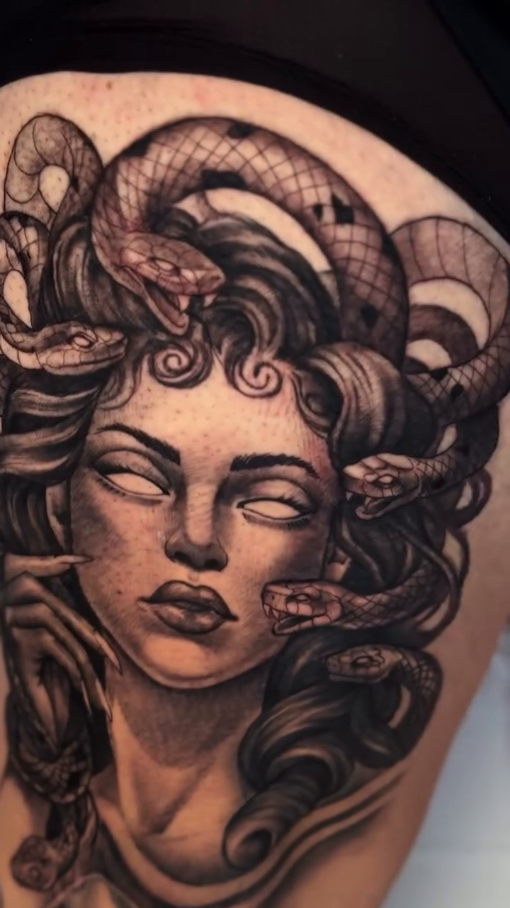 Medusa with snakes and roses realism tattoo by Isiah Hall, Whittier, California