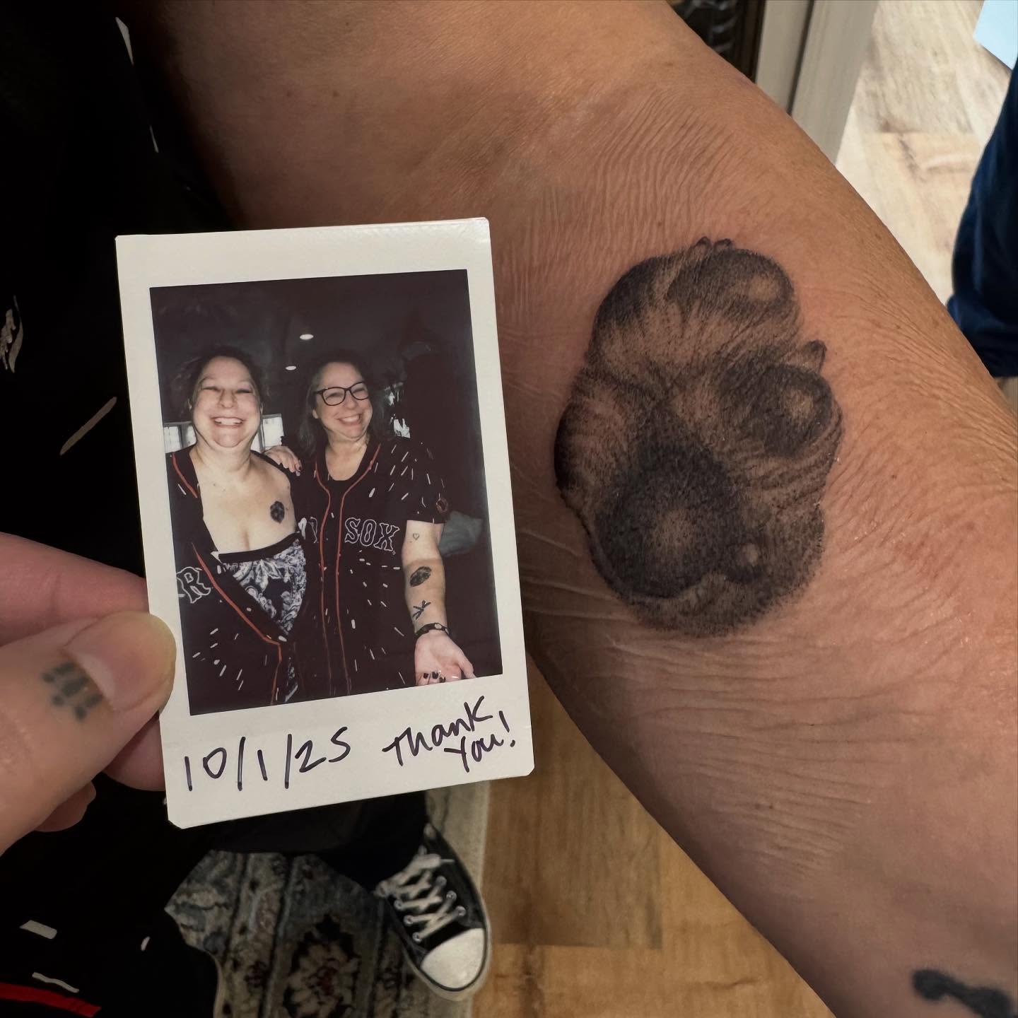 Flower black and grey tattoo on the forearm by Sarah Seveney
