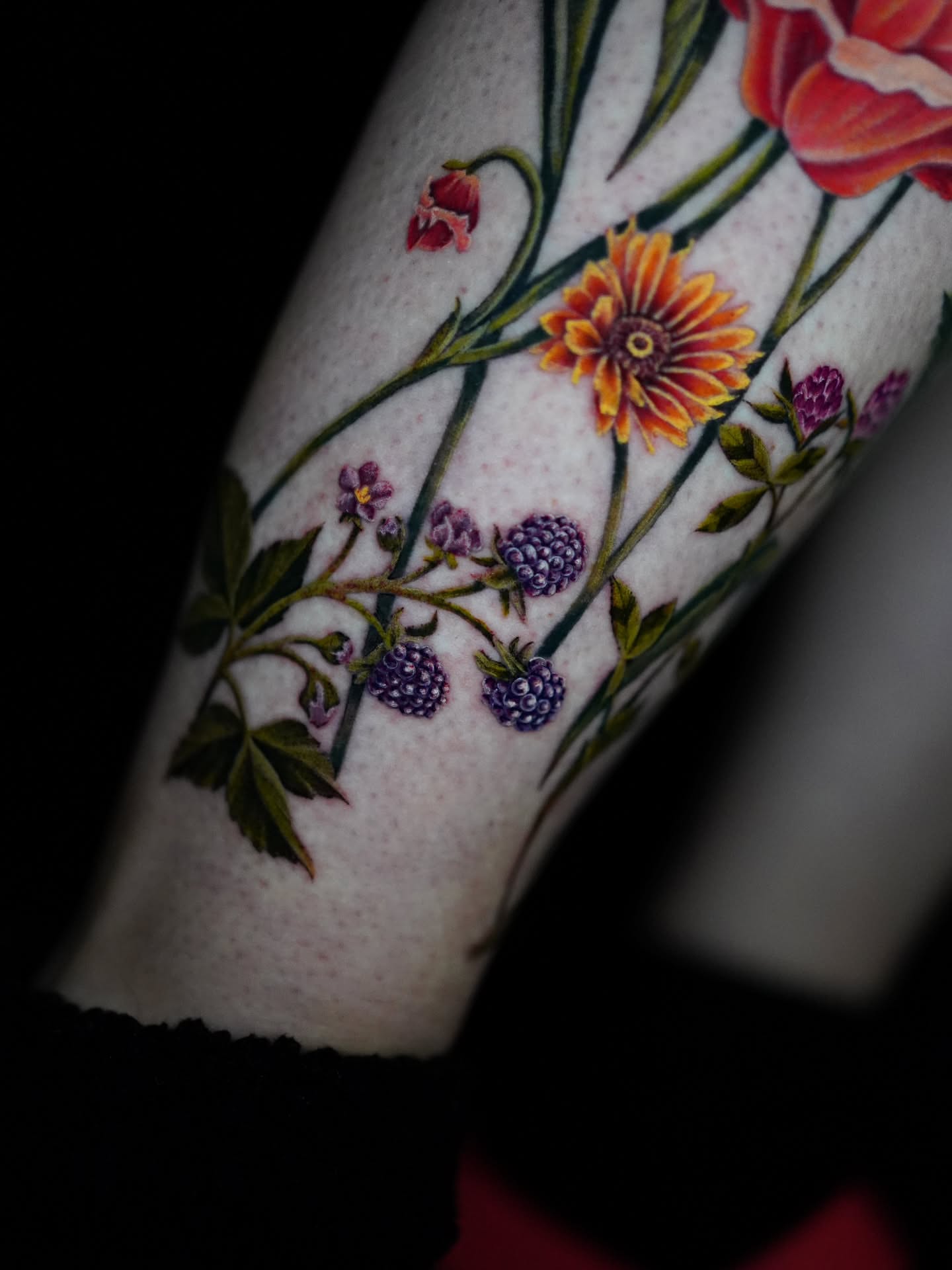 Floral arrangement realism tattoo on the forearm by Shar - Utah Tattoo Artist