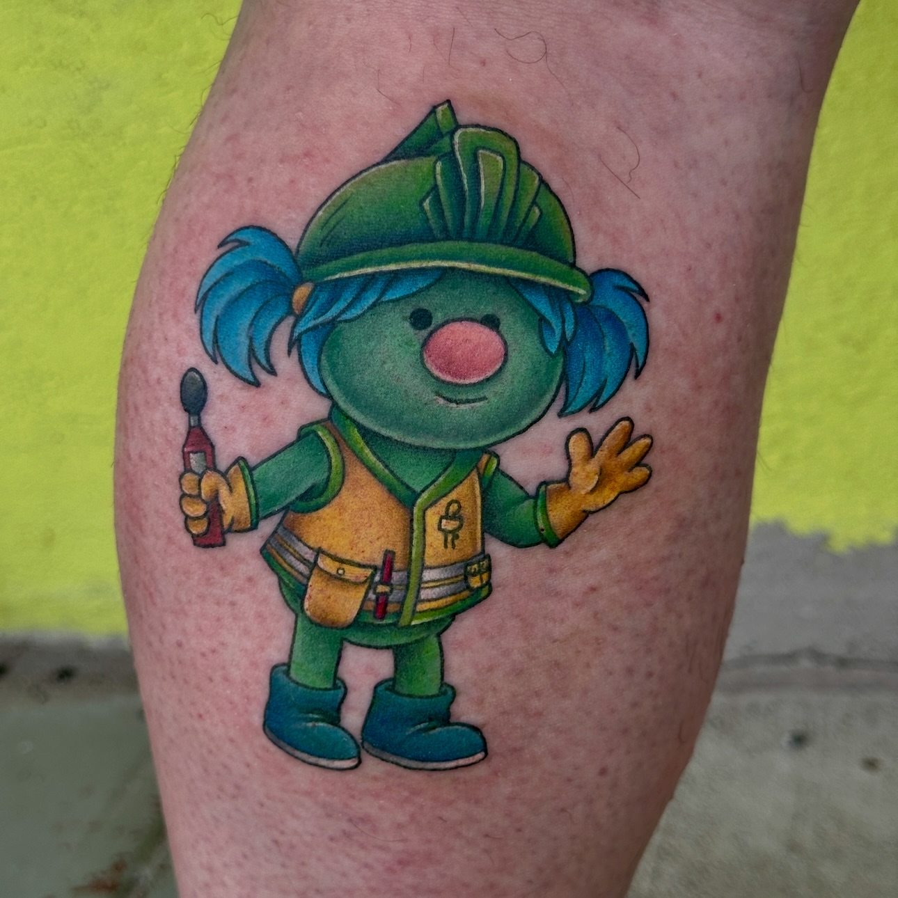 Gumby illustrative tattoo on the thigh by Holle Hellfire