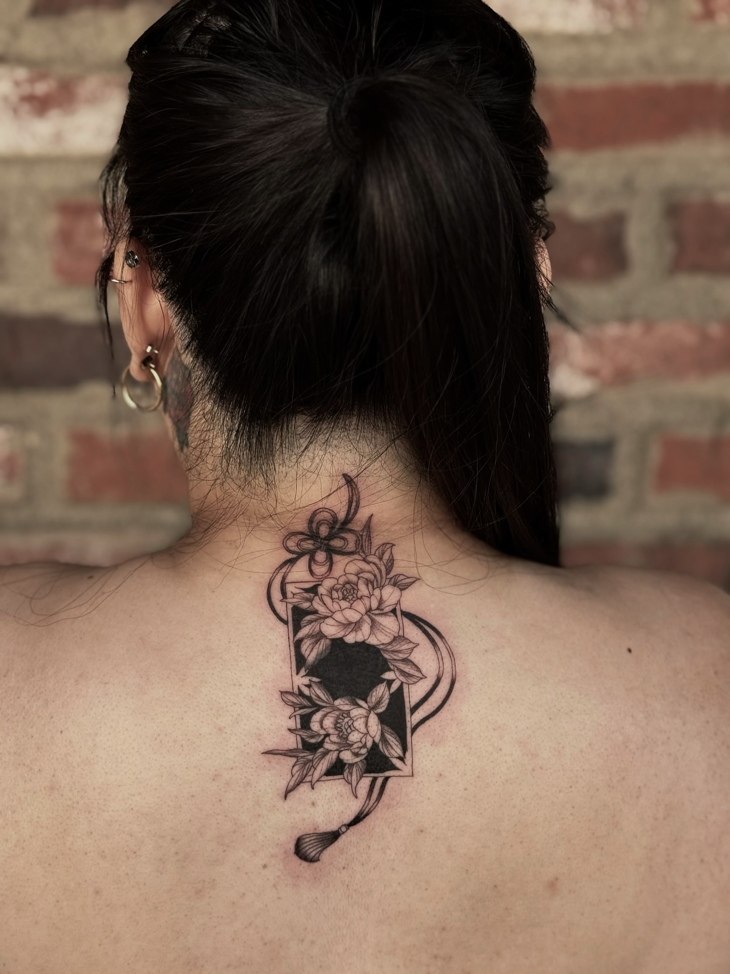Floral design black and grey tattoo on the back by Virginia 🥀Neo Traditional