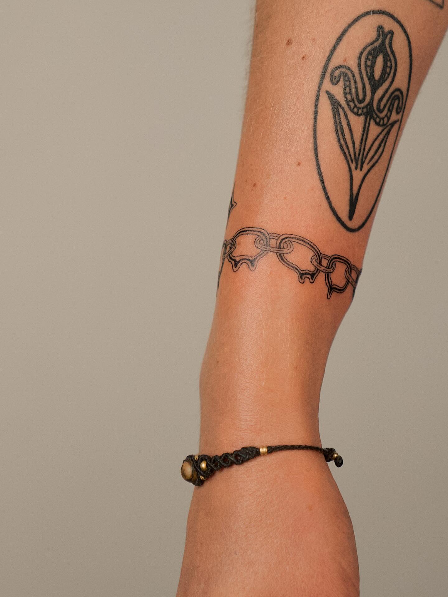 Chain black and grey tattoo on the forearm by b i l l i e, Seattle, Washington