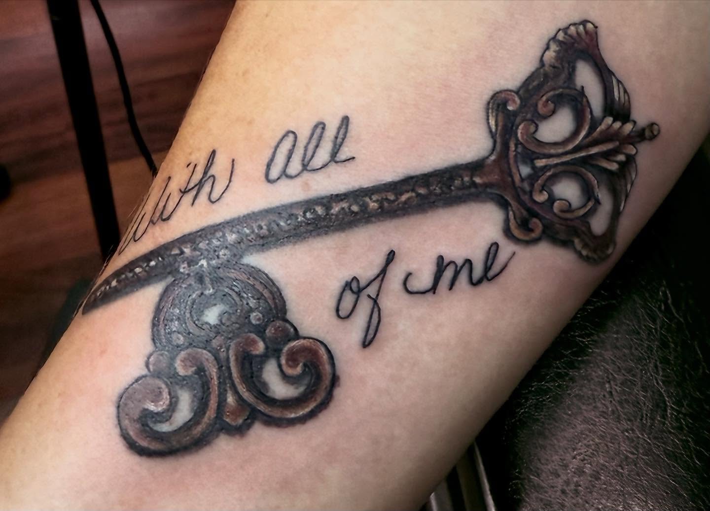 Key ornamental tattoo on the forearm by @lady_raven_tattoo