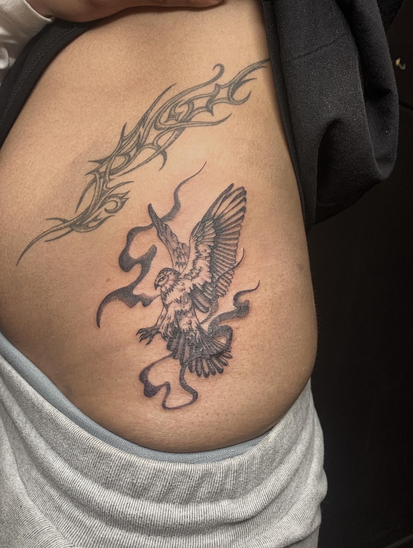 Eagle tribal tattoo on the ribs by Jess, Midvale, Utah