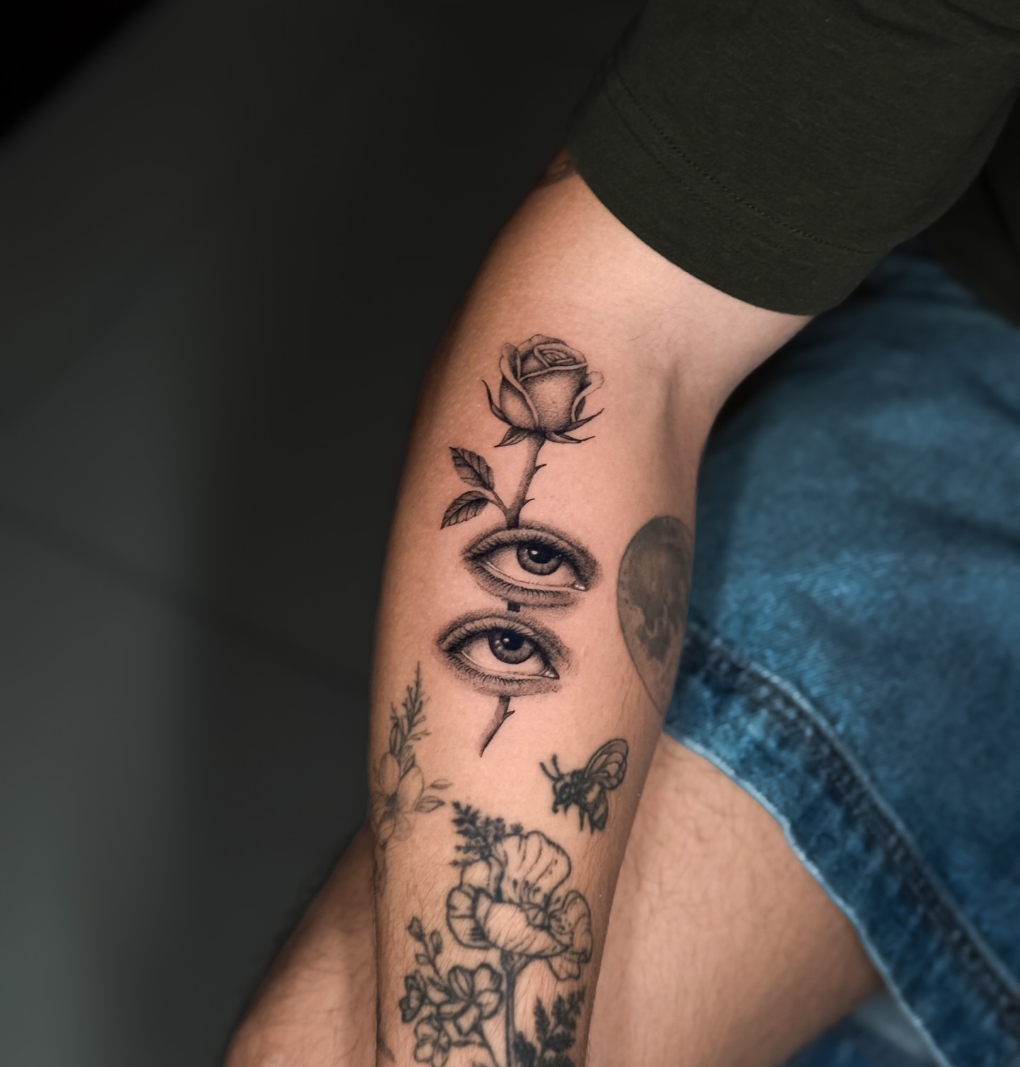 Eye and rose realism tattoo on the forearm by Miami Tattoo Artist, Miami, Florida