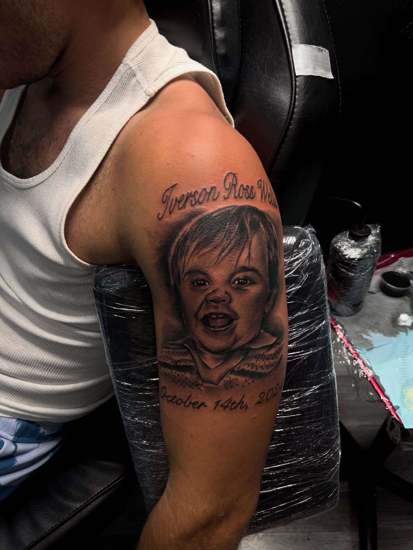 Child portrait realism tattoo on the forearm by Zeus