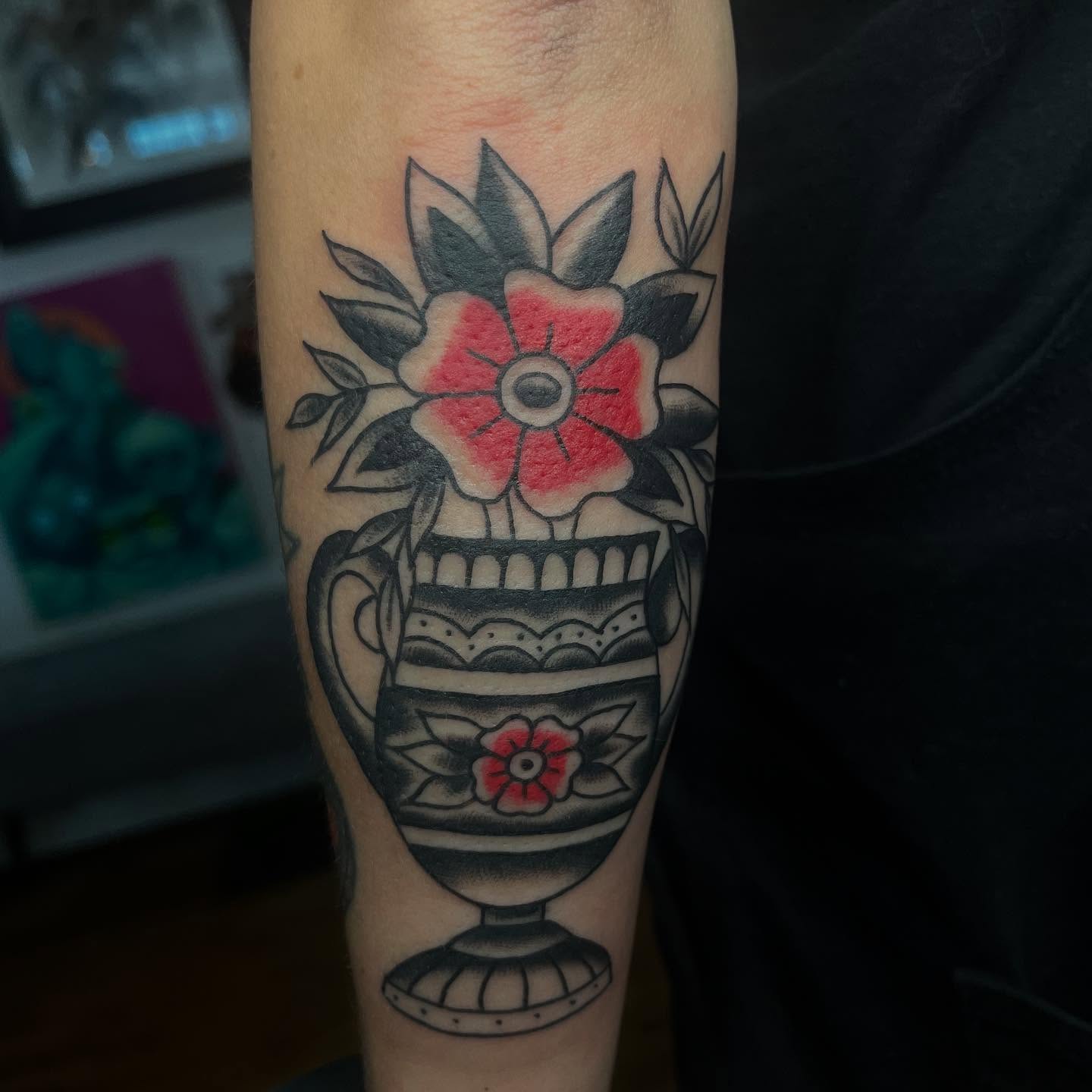 Flower vase American traditional tattoo on the forearm by Mariah Nguyen
