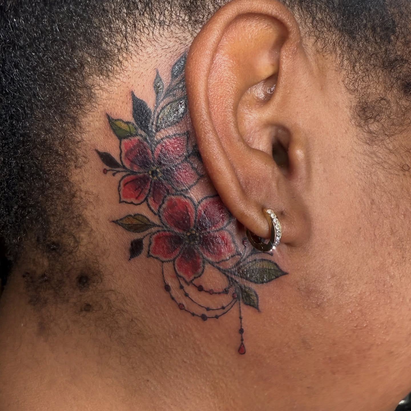 Floral arrangement American traditional tattoo on the neck by Chloe Peters 🦭🦄🏳️‍🌈