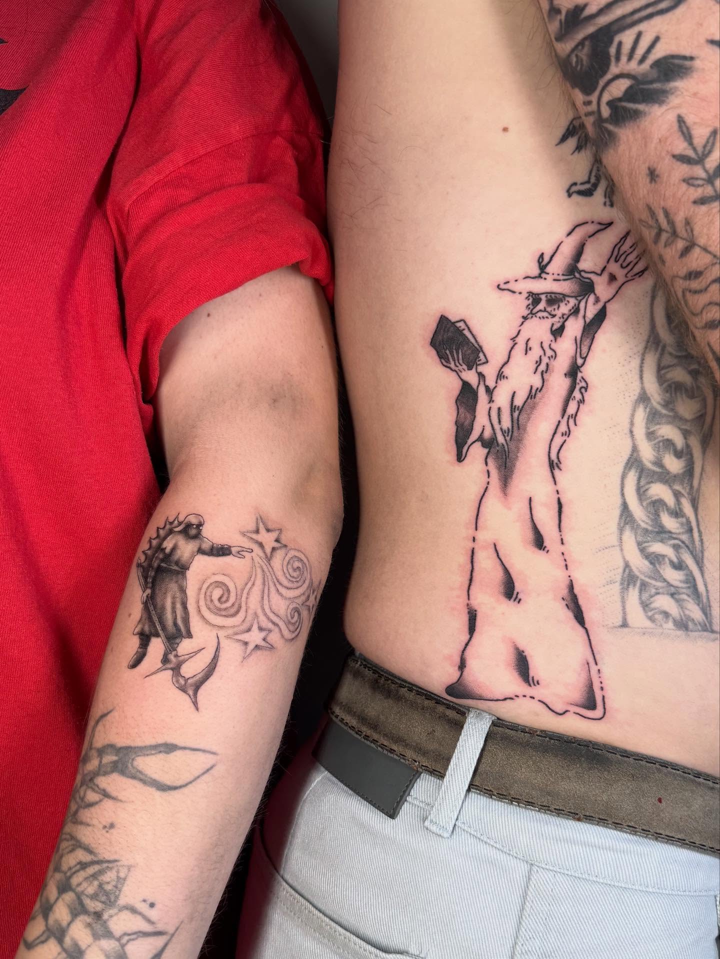 Wizard casting spell black and grey tattoo on the torso by @mr.smiley___
