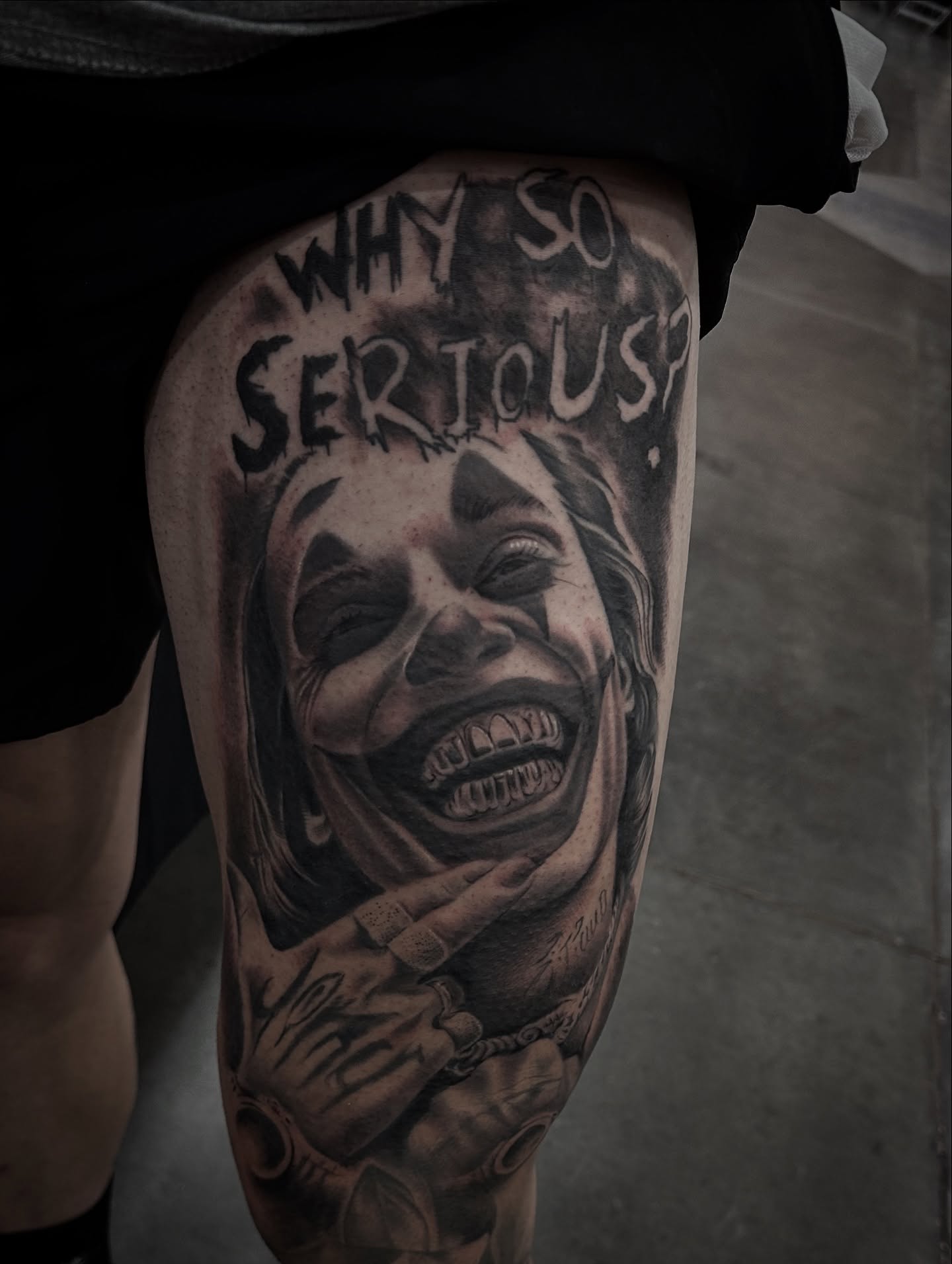 Joker realism tattoo on the thigh by Tattoo Artist - the Goat