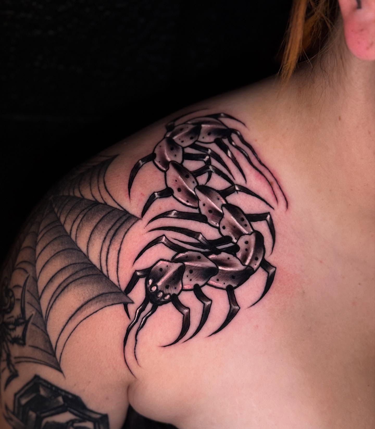 Scorpion black and grey tattoo on the shoulder by Thomas Martinez
