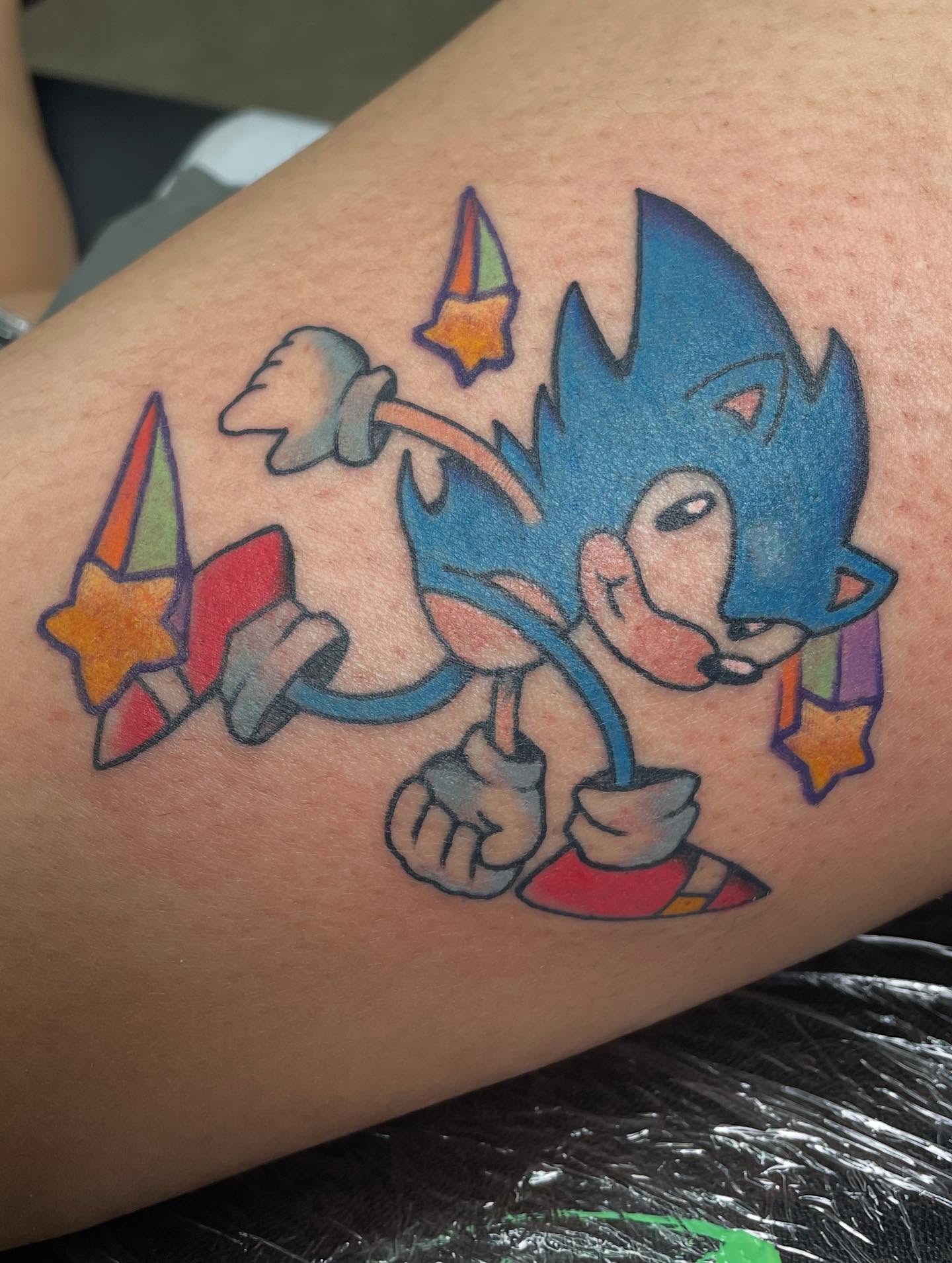 Sonic the Hedgehog new school tattoo on the forearm by Fionna Fanning