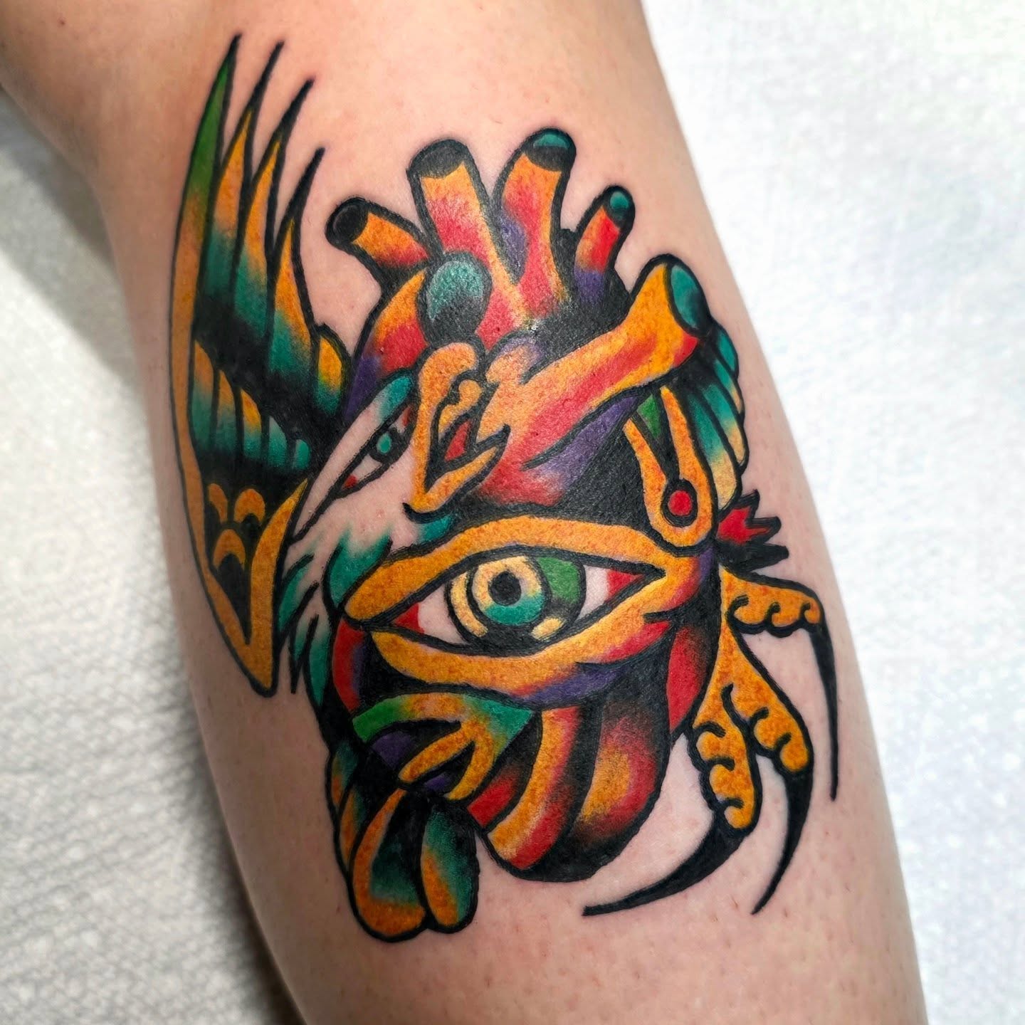 Heart with wings new school tattoo on the forearm by Mitch Braver
