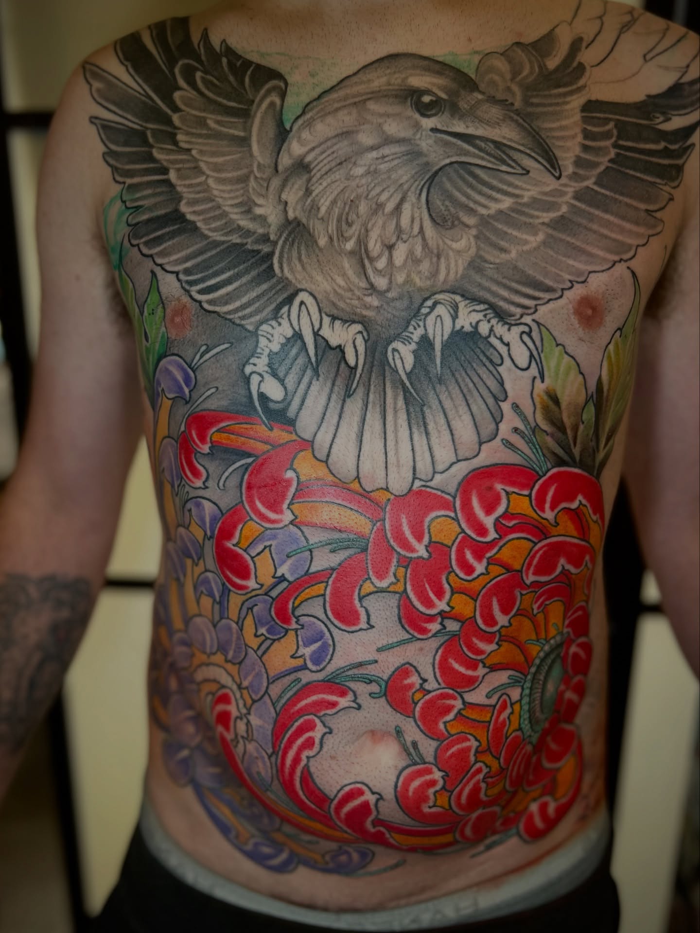 Crow and floral japanese irezumi tattoo on the back by Ryan Willard, Denver, Colorado