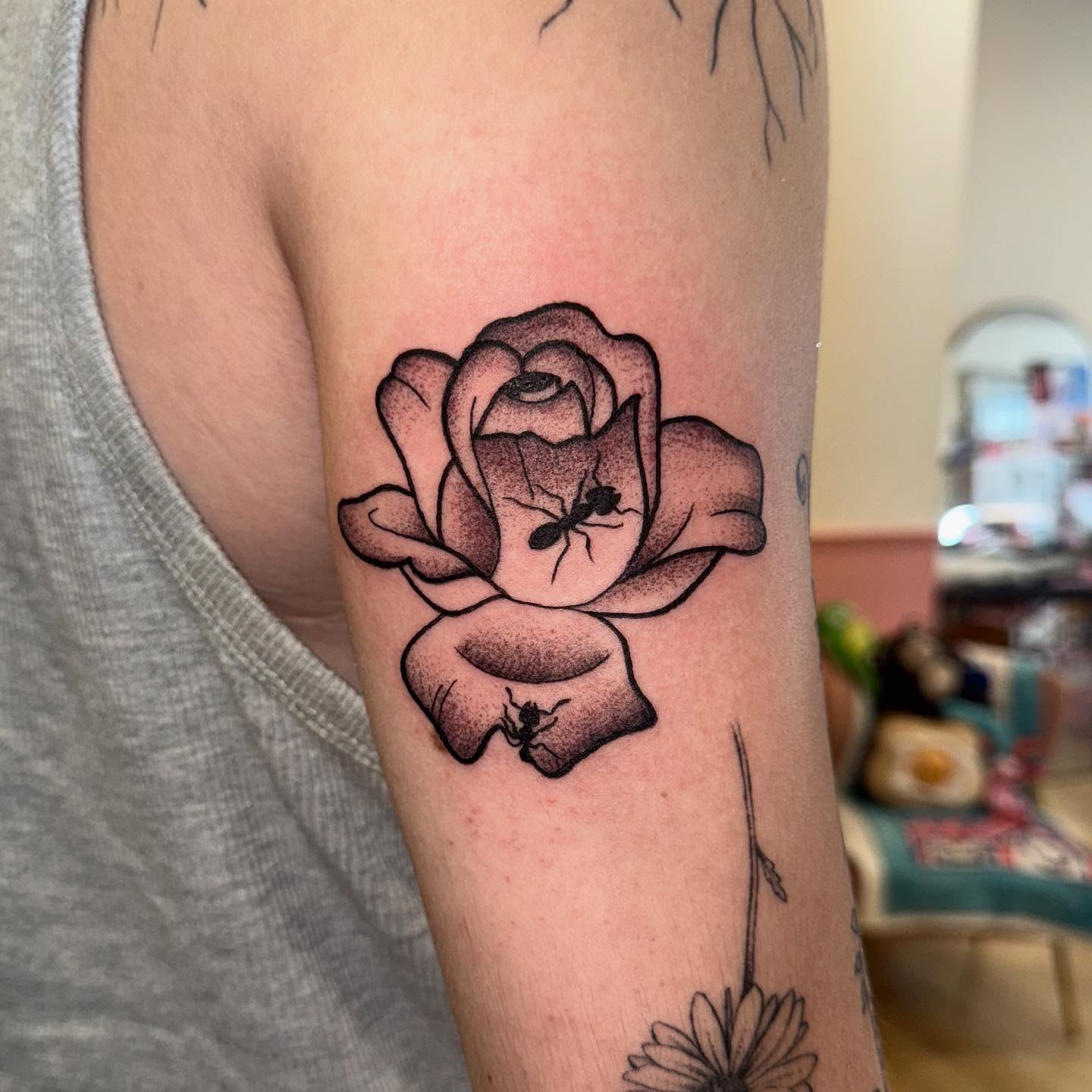 Rose dotwork tattoo on the forearm by Laurito