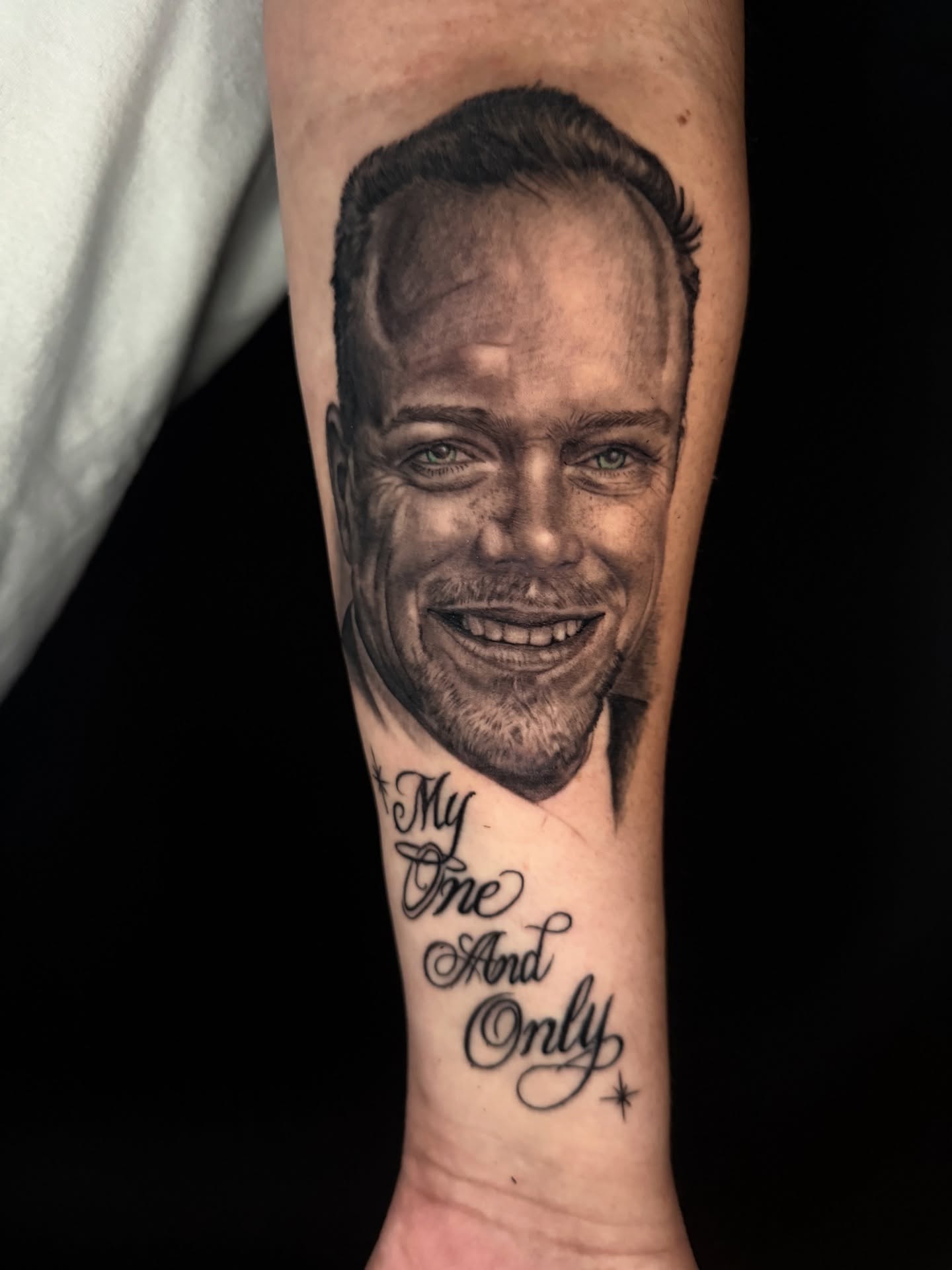 Portrait realism tattoo on the forearm by Adrian Dominguez, Las Vegas, Nevada