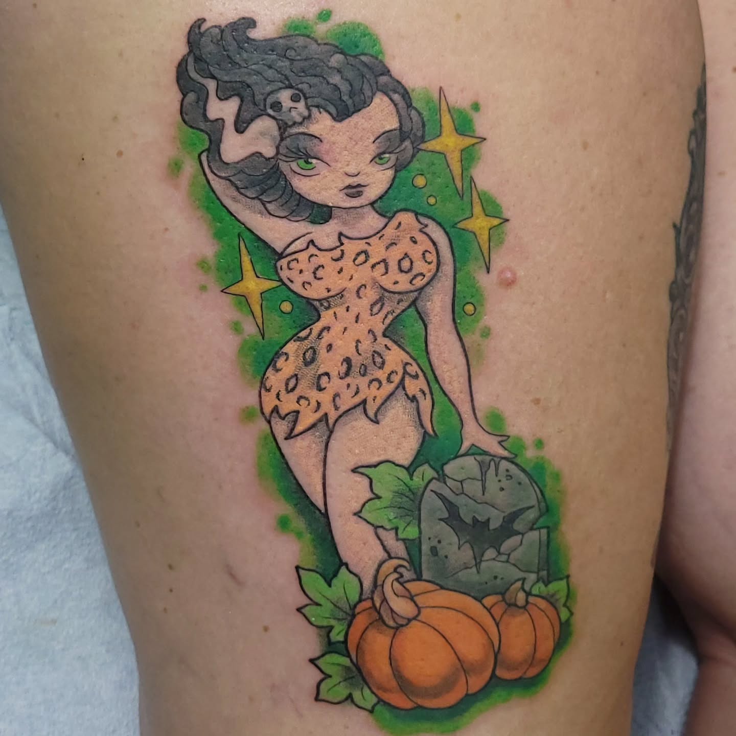 Woman with pumpkins new school tattoo on the thigh by Austin Berry