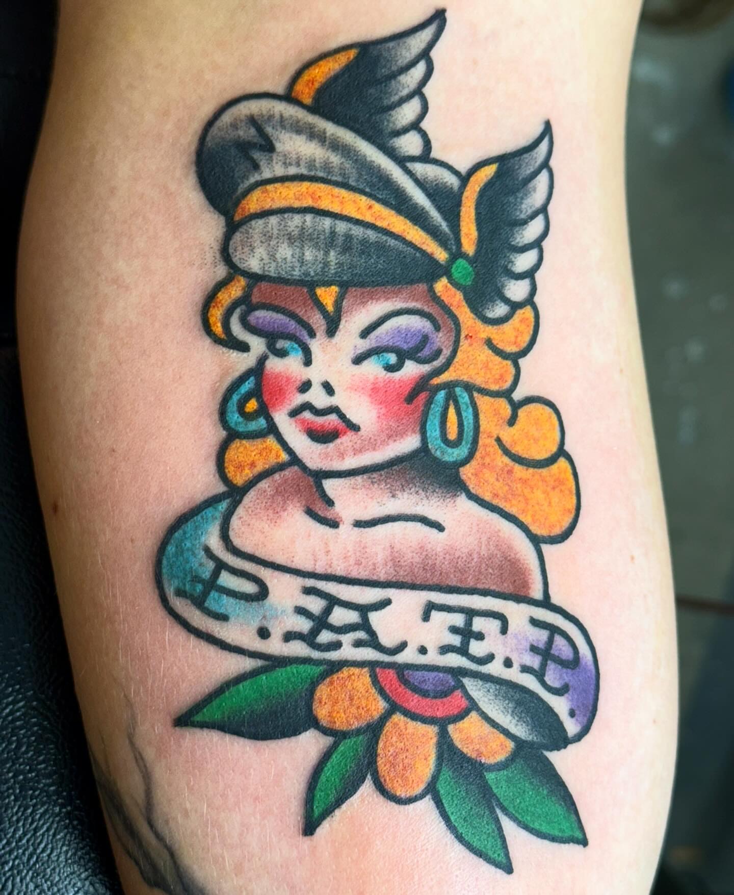Woman with hat American traditional tattoo on the thigh by Sam Hambrick, Watchung NJ