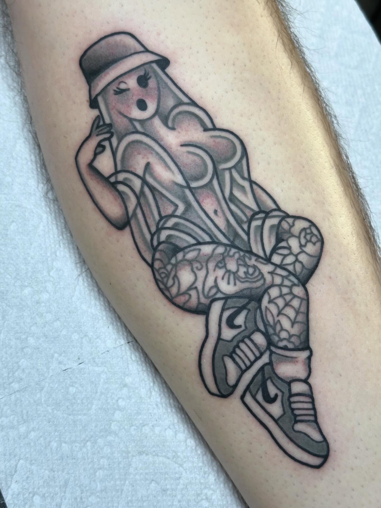 Ghostly figure black and grey tattoo on the forearm by Ginny Marie Kalnasy