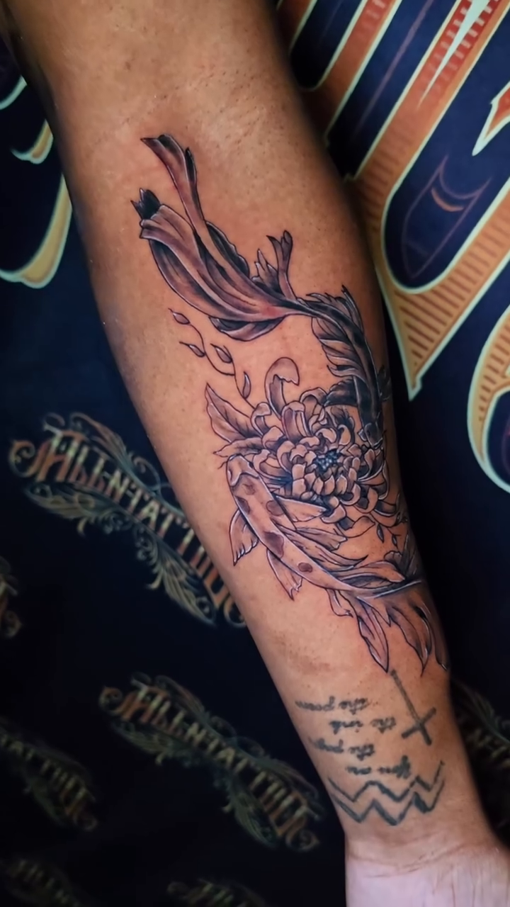 Chrysanthemum and koi fish japanese irezumi tattoo by Jesse James, Las Vegas, Nevada
