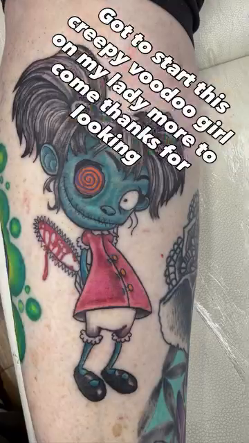 Creepy voodoo girl with chainsaw tattoo on the forearm by Jason Topliss