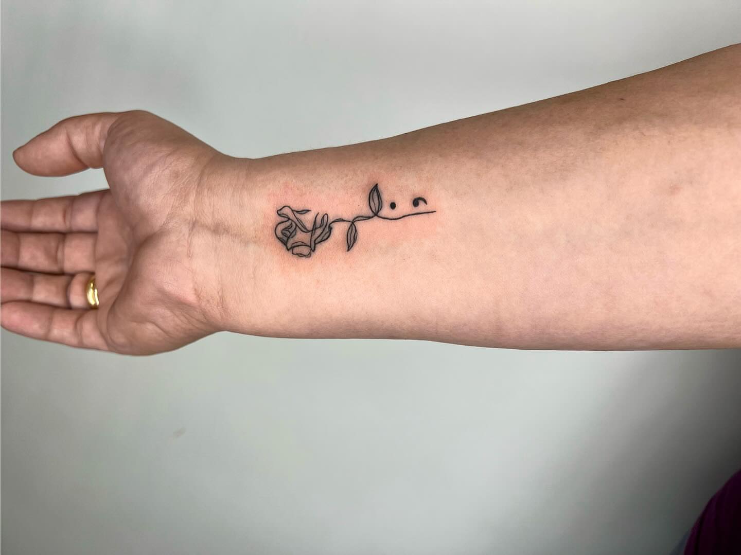 Rose and vine fine line tattoo on the forearm by Joey tattoo