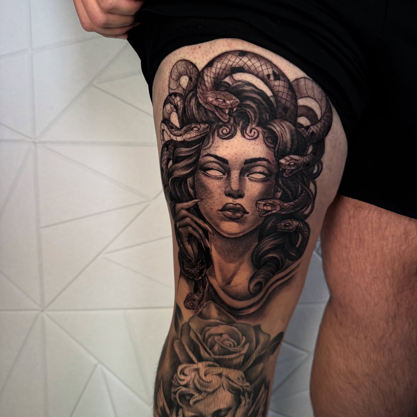 Medusa realism tattoo on the thigh by Isiah Hall, Whittier, California