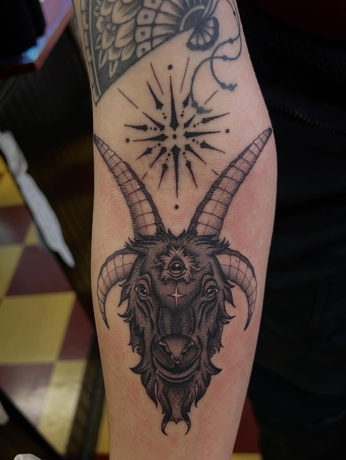 Goat head realism tattoo on the forearm by ♛Mollie Evans