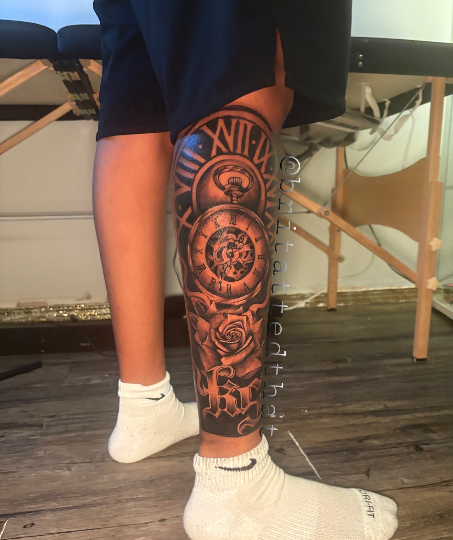 Clock and rose black and grey tattoo on the calf by Bri Tatted That