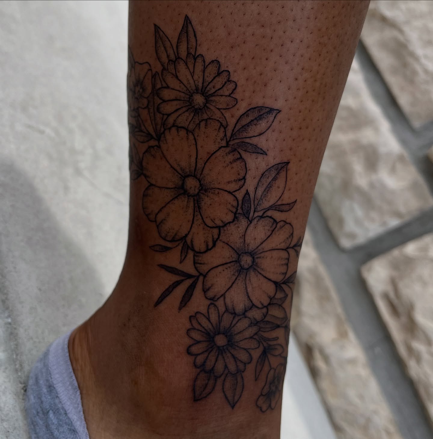 Flowers black and grey tattoo on the forearm by Tina Petrullo, West Chester Township, Butler County, Ohio